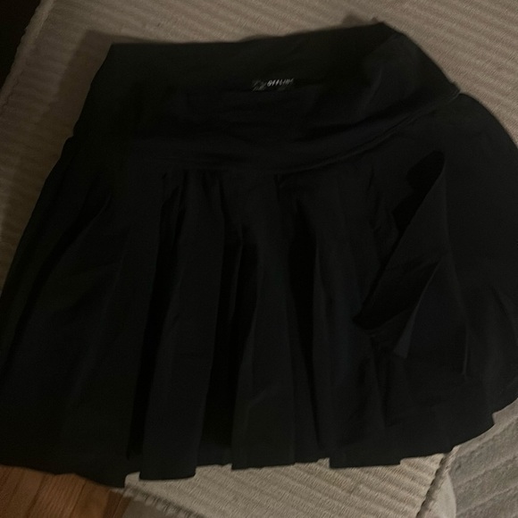Offline pleated black skirt.  Built in shorts.  Gently used. - Picture 1 of 2